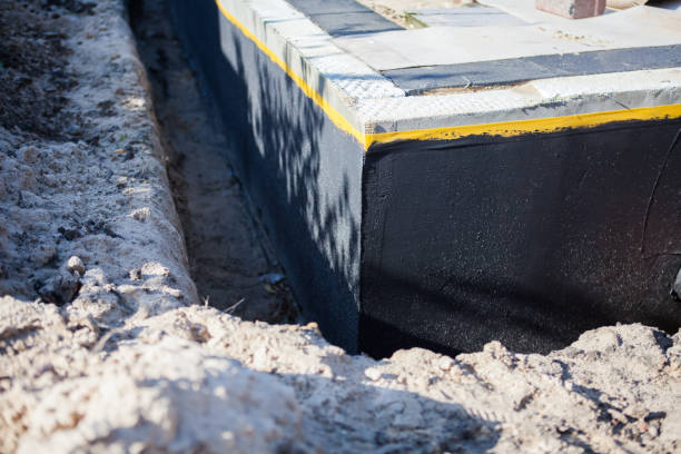 Professional Exterior Waterproofing technician working in Grand Island, NY